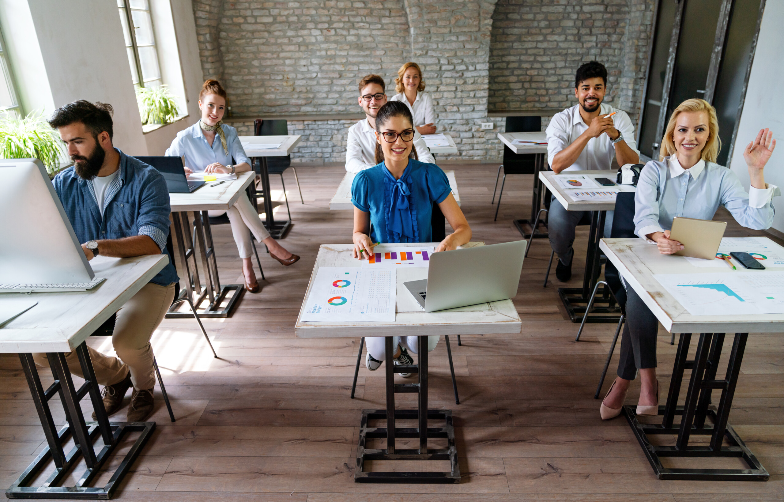 Group of multinational business people develop themselves in business training, meeting in office
